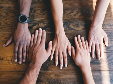 hands on a table